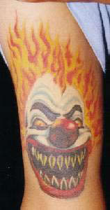 Smiling clown tattoo